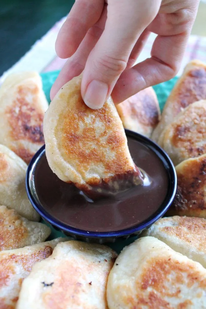 Swiss Chalet Cheese Perogies — golden fried dumplings served with Cajun sour cream dipping sauce