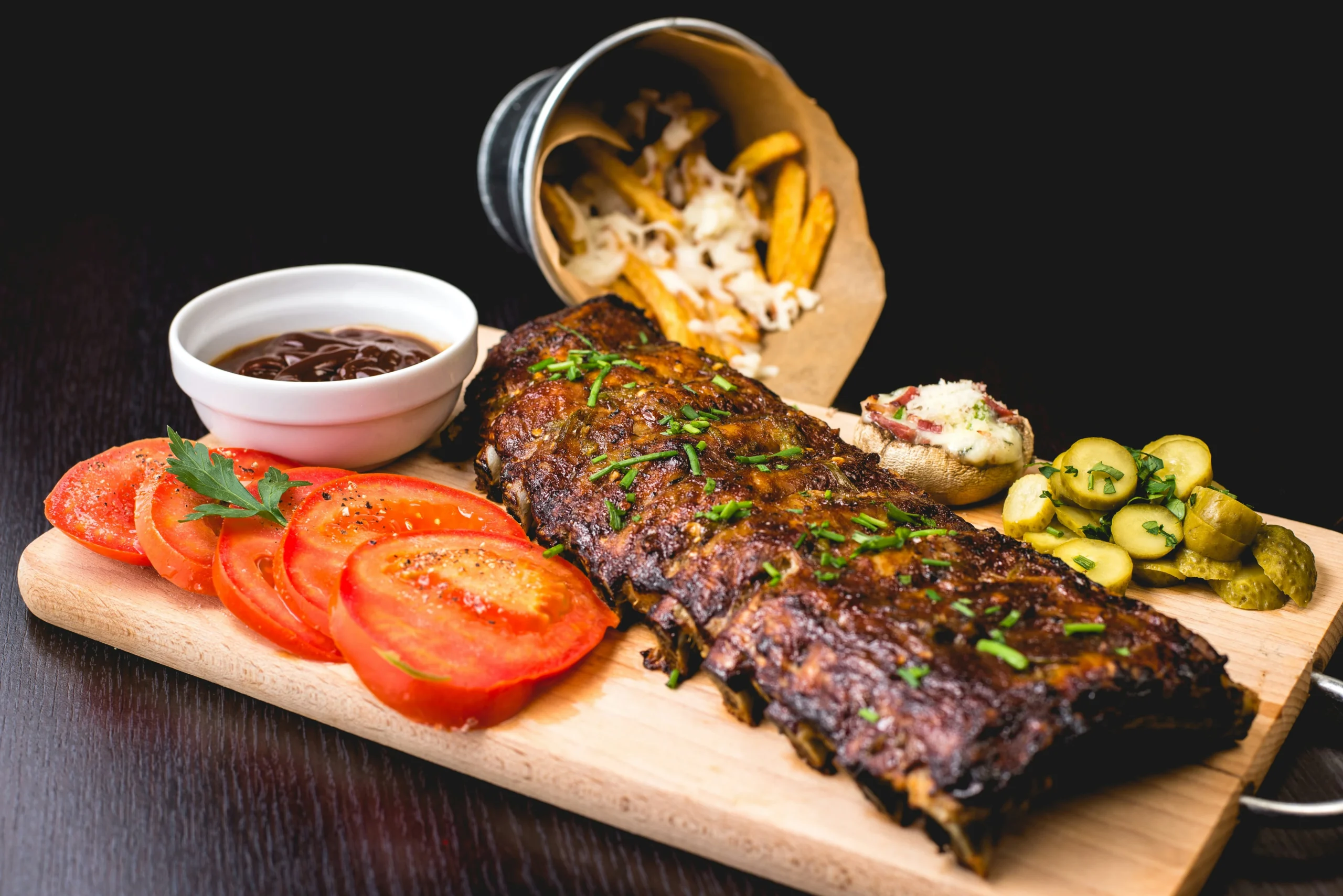 Swiss Chalet Seasoned Dry Ribs — lightly seasoned ribs served with sweet chili dipping sauce